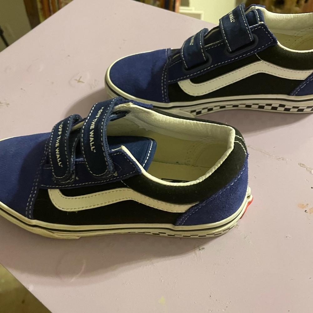 Blue black and white vans
